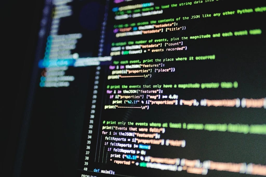 Applicatiecode op een monitor, passend bij full-stack development.